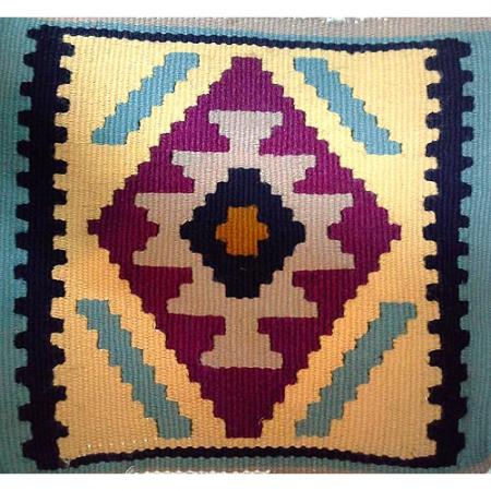 بررسی ویژگی های گلیم پشمی رنگ طبیعی